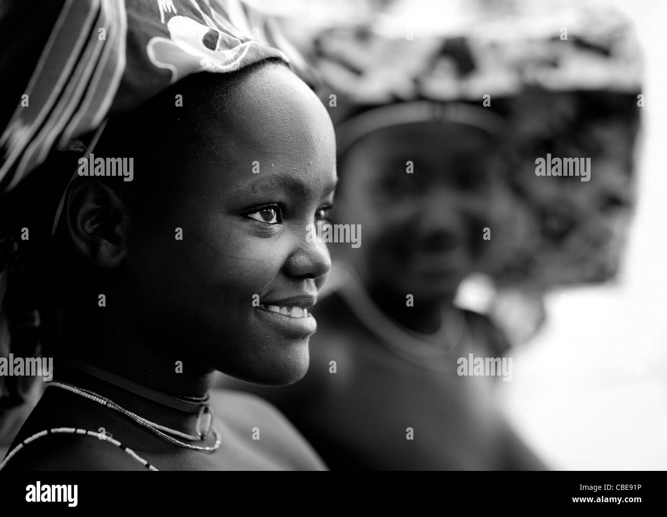 Mucubal Girls With Ompota Headdress, Virie Area, Angola Stock Photo