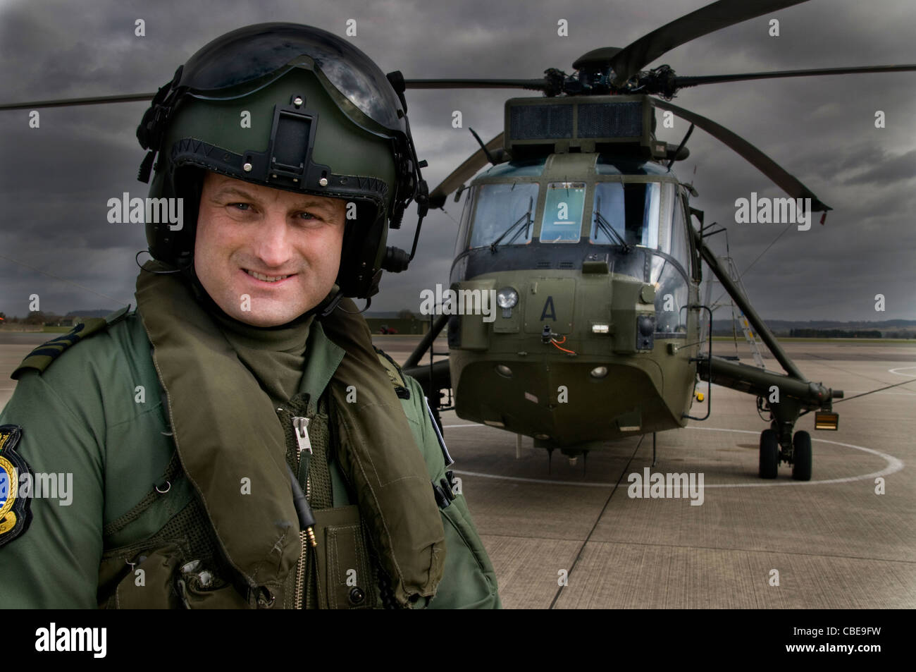 A Royal Navy  pilot of a 'junglie' Seaking 4 helicopter Stock Photo