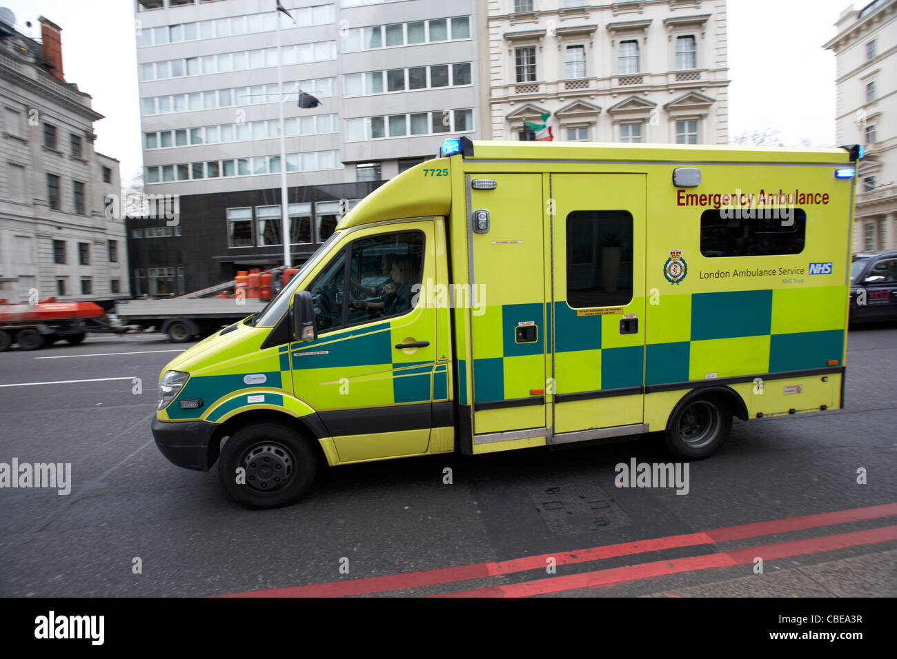 nhs london ambulance service vehicle speeding through streets on call out london england uk united kingdom Stock Photo