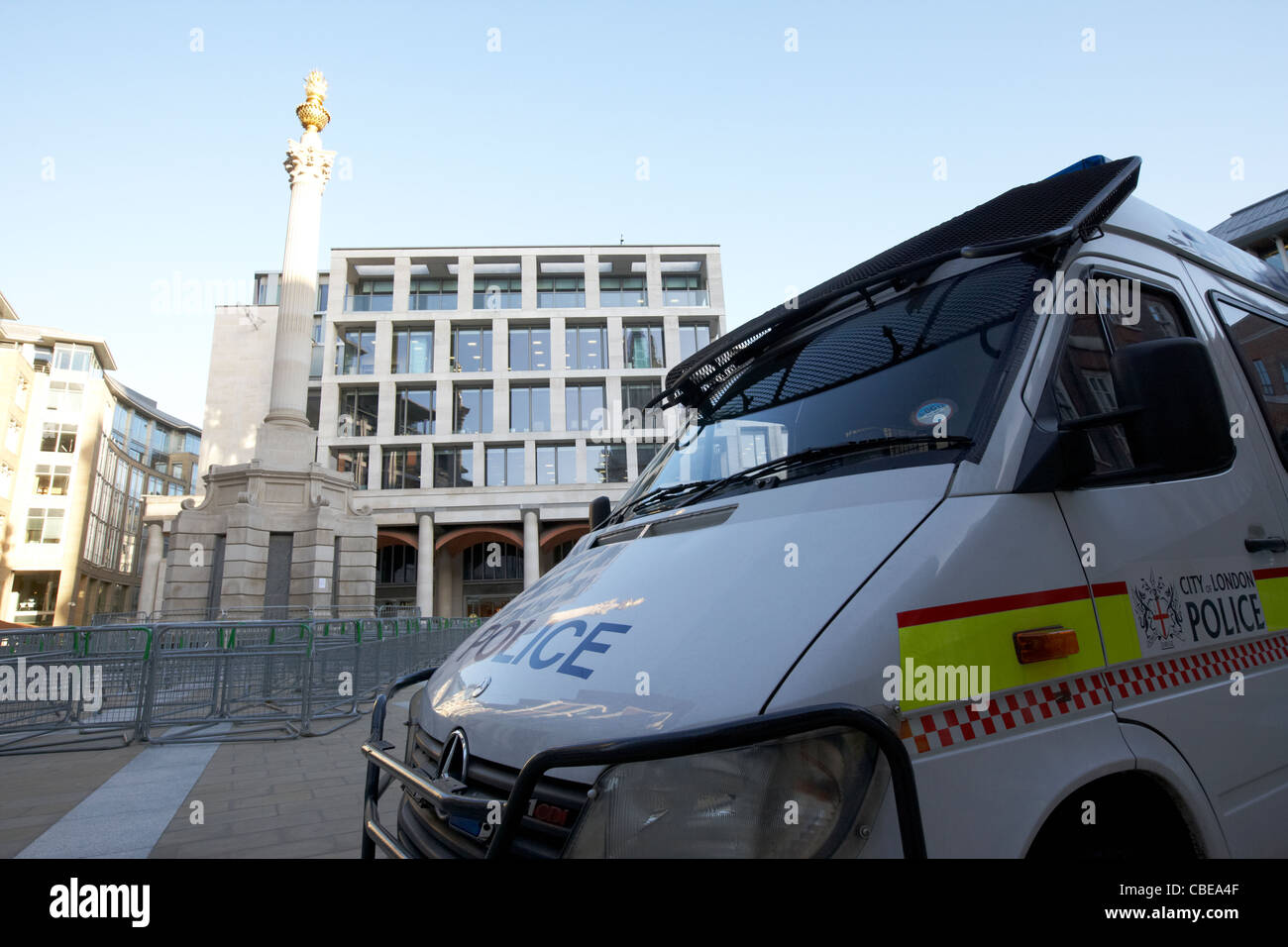 city of london police riot vehicle and crowd control barriers closing off paternoster square and london stock exchange Stock Photo