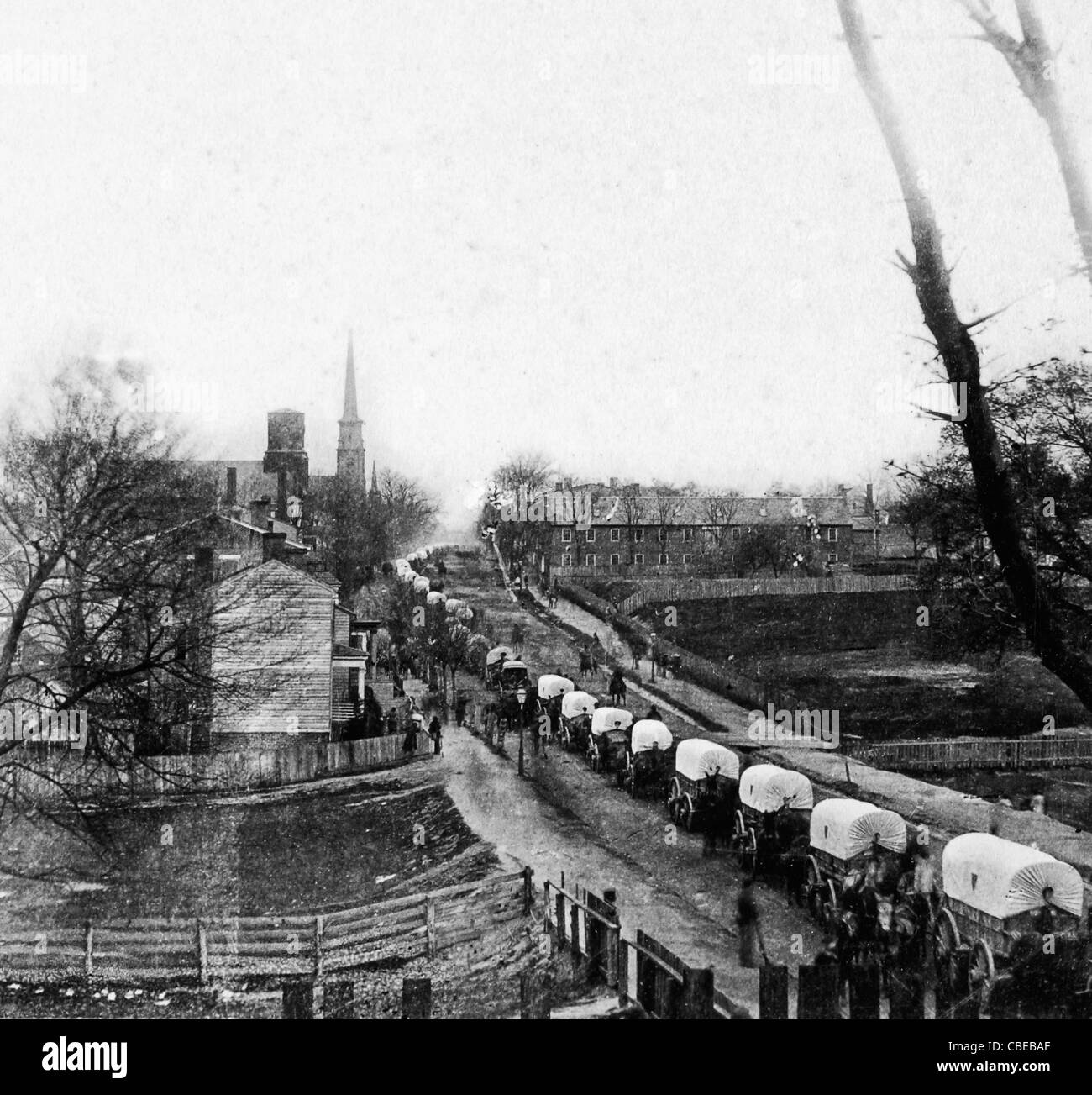 Petersburg, Virginia. The first Federal wagon train enterering the town during USA Civil War, 1865 Stock Photo