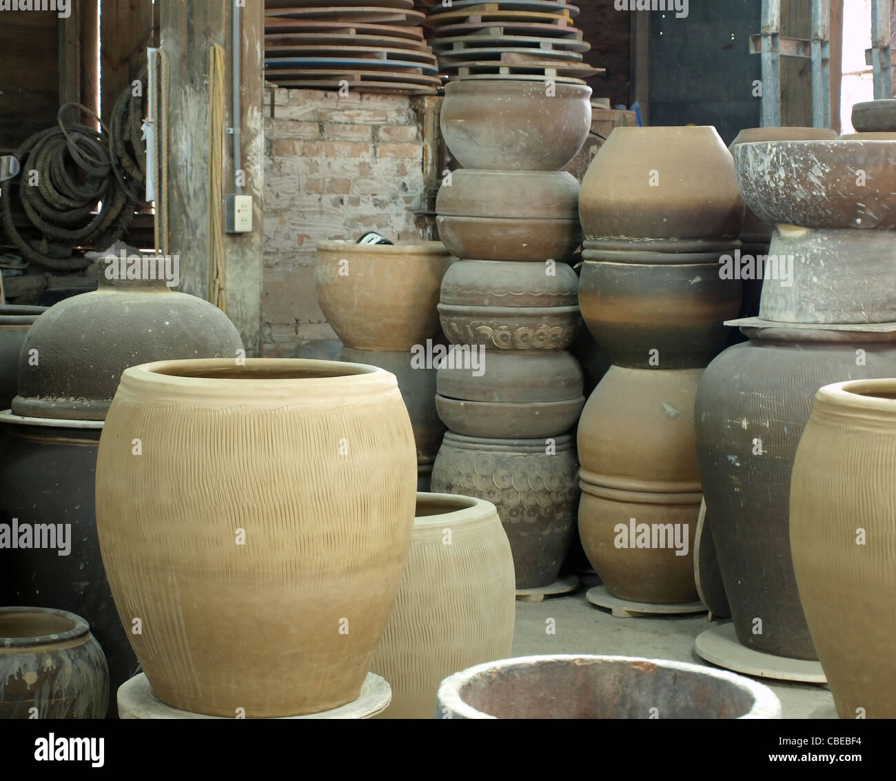 Large ceramic vessels in a pottery Stock Photo Alamy