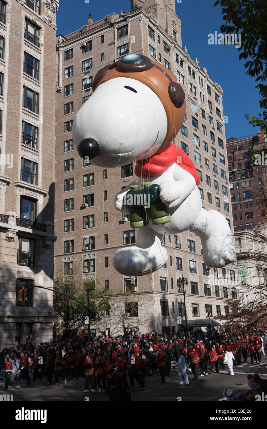 The Snoopy the Flying Ace helium filled balloon floats overhead during the  2011 Macy's Thanksgiving Day Parade in New York City Stock Photo - Alamy