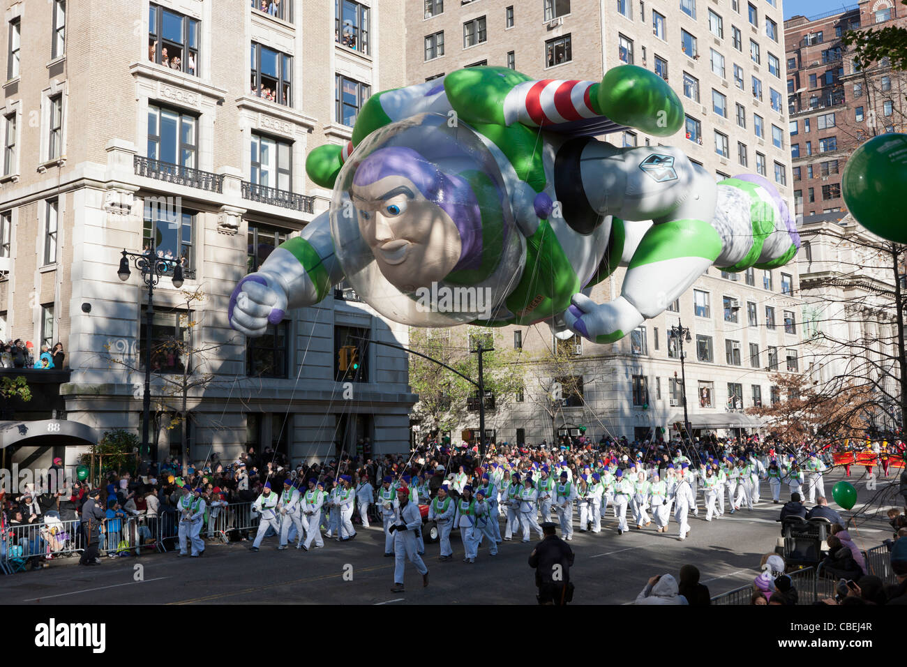 The Buzz Lightyear helium filled balloon floats overhead during the 2011 Macy's Thanksgiving Day Parade in New York City. Stock Photo