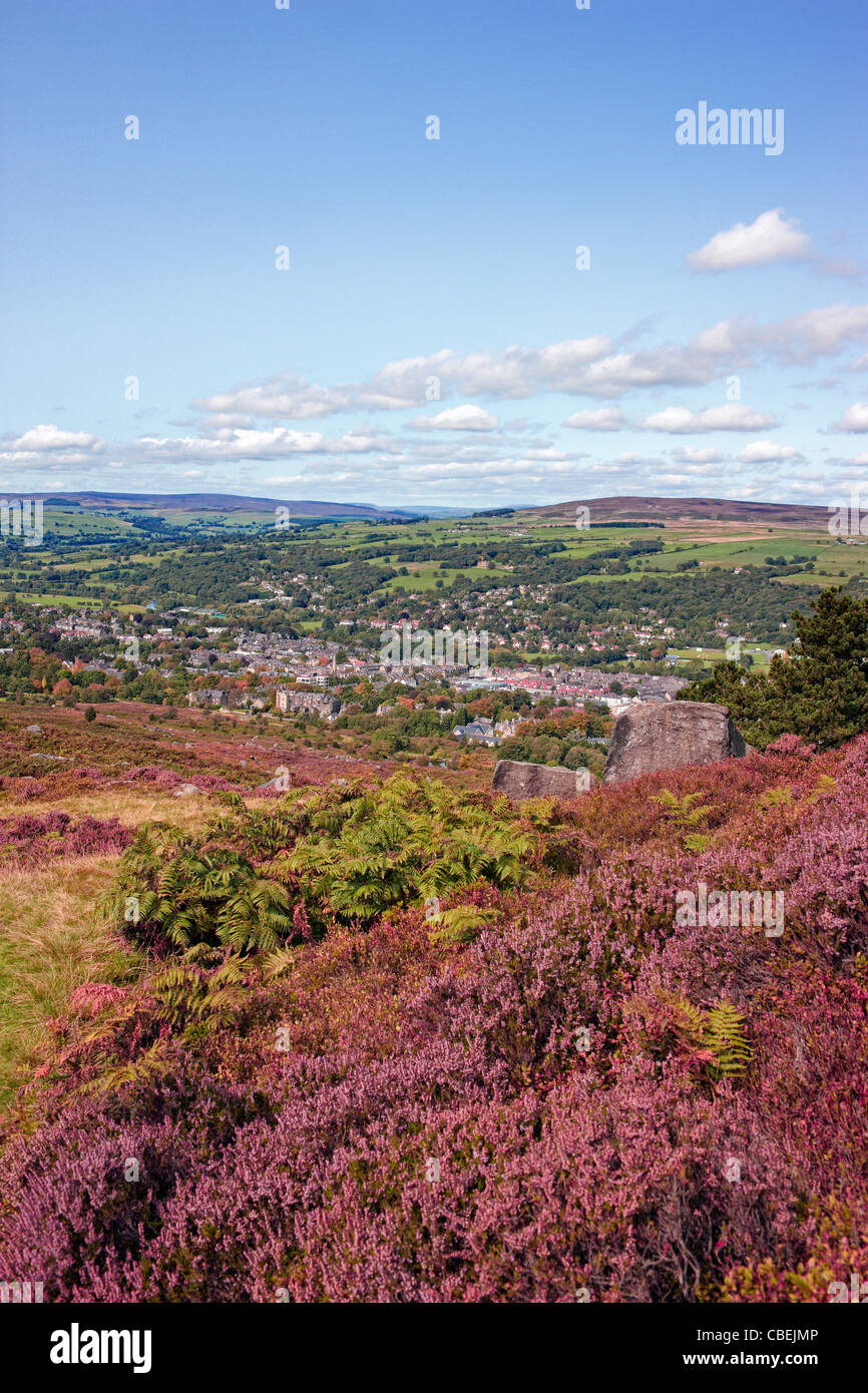 Looking down onto the town of Ilkley from the heather covered Ilkley Moor. Stock Photo