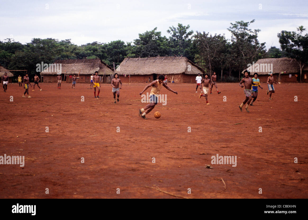 A-Ukre village, Brazil. Football game in a Kayapo Indian village; looking through the goal; Xingu Indigenous Area, Para State. Stock Photo