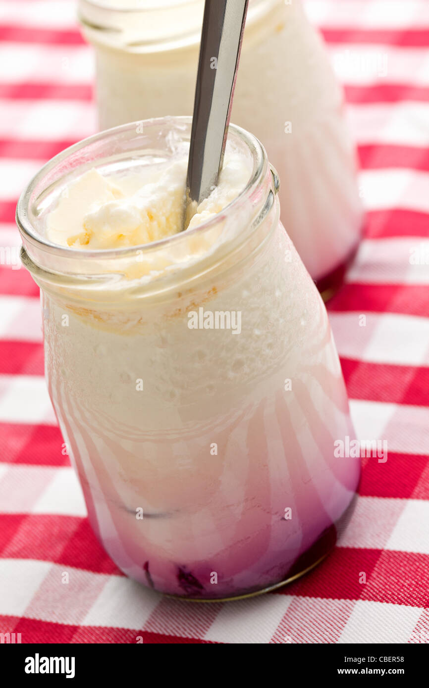 the white yogurt in glass jar Stock Photo