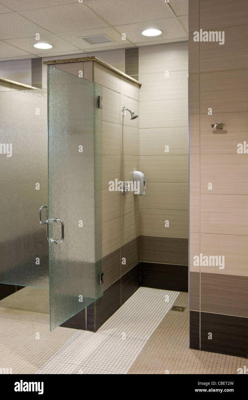 Shower Stalls In Health Club Bathroom Stock Photo Alamy