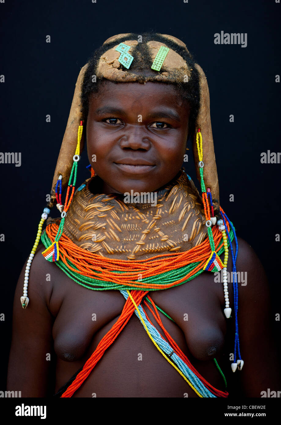 Mwila Girl With The Traditional Vikeka Mud Necklace, Angola Stock Photo