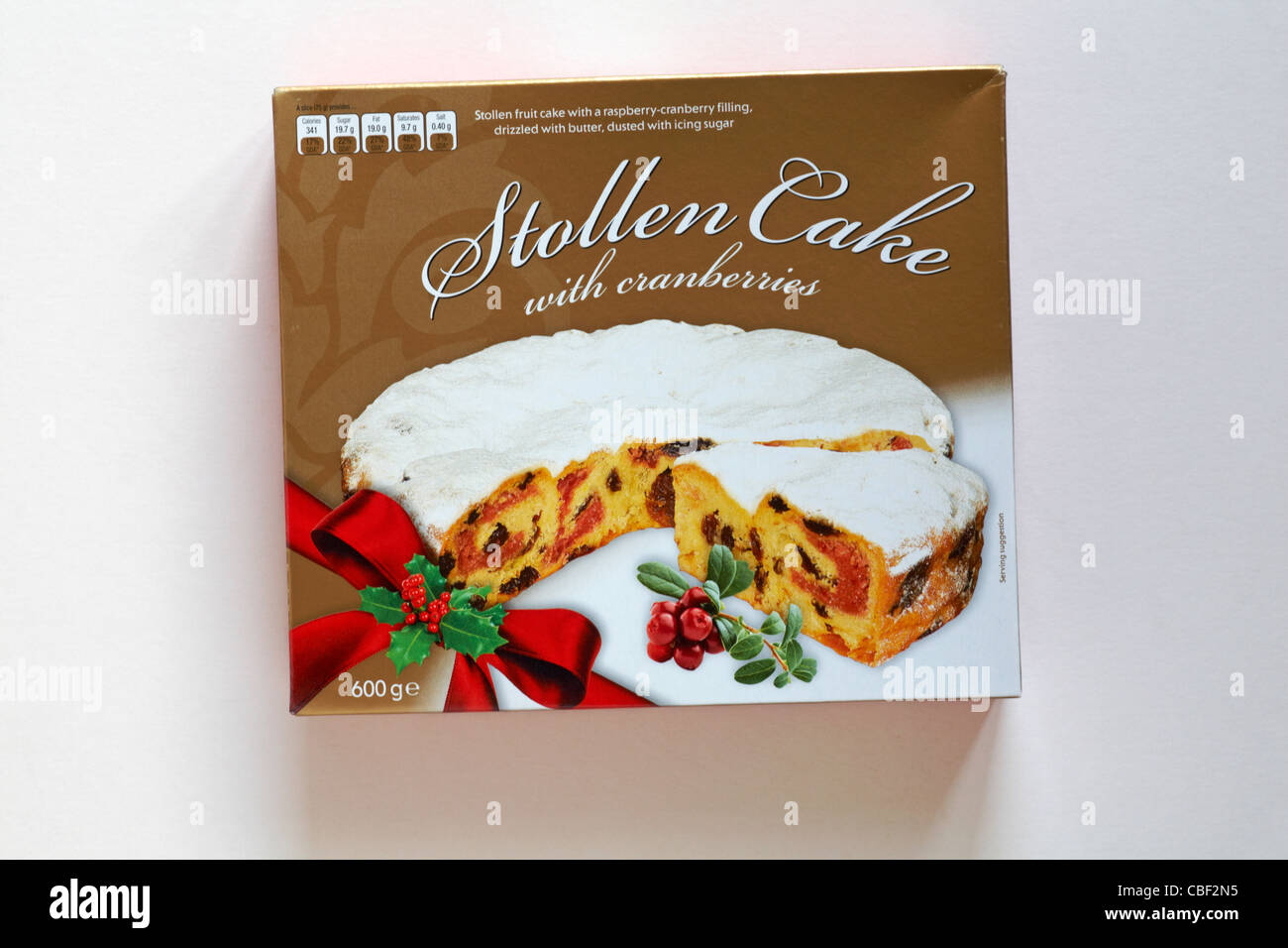 Box of Stollen cake with cranberries isolated on white background Stock Photo