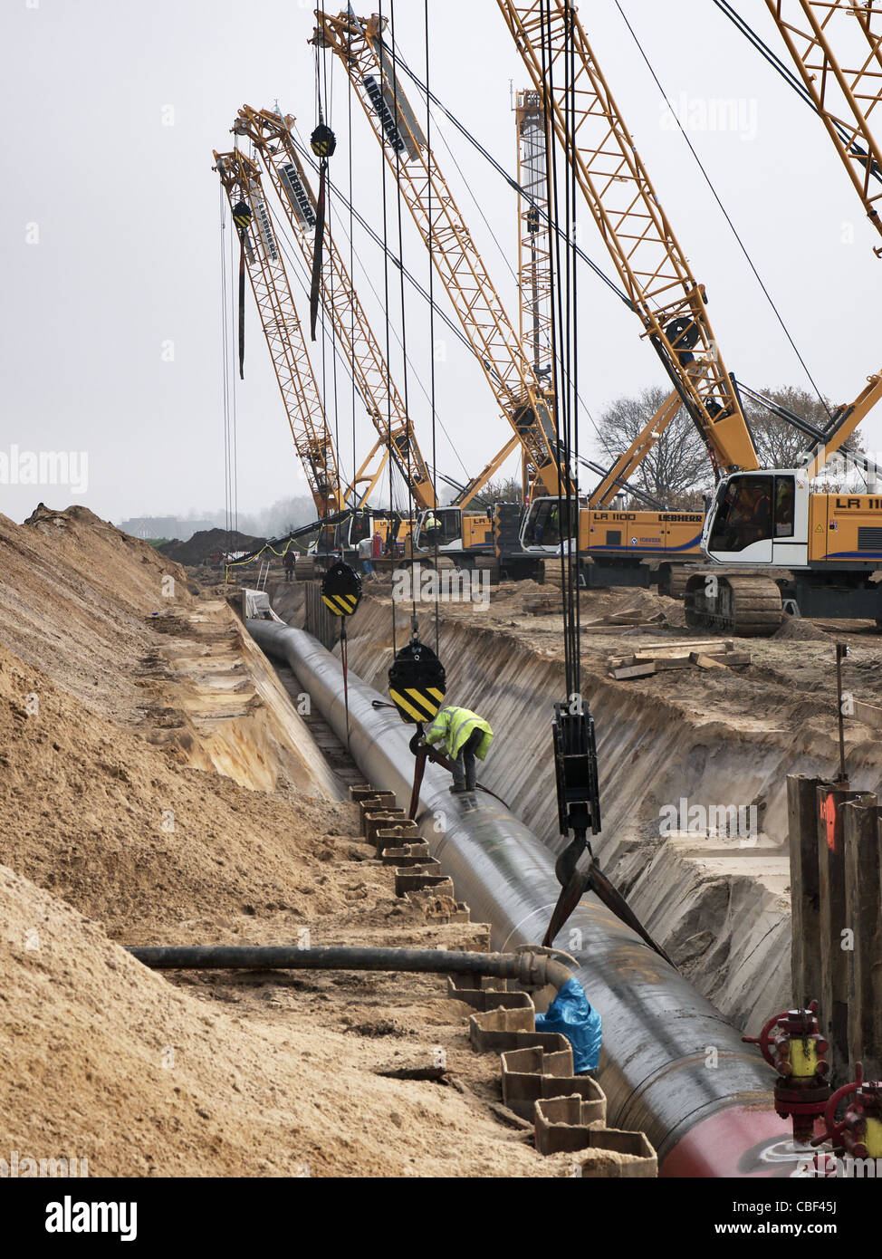 Building a gas pipeline connecting with the Nord Stream Pipeline between Russia and Western Europe. Stock Photo