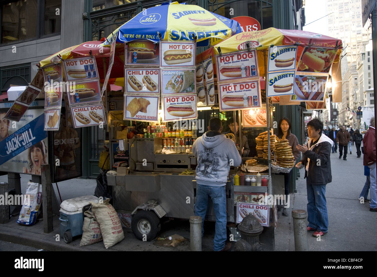 Hot dog vendor on 5th Avenue in NYC. Stock Photo