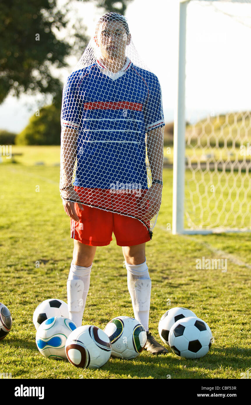 Portrait of a male soccer football player. Stock Photo