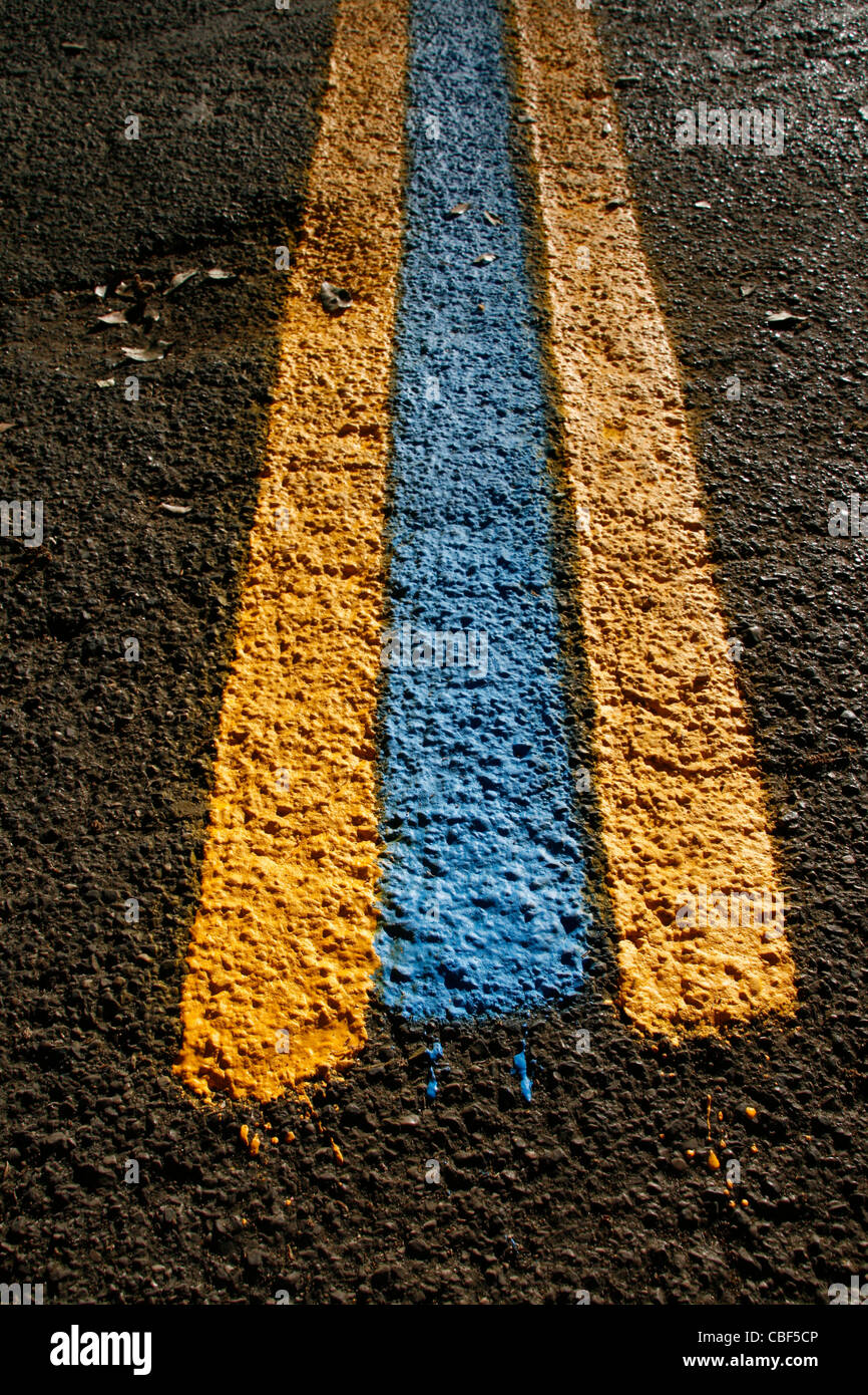 road surface with new painted street markings Stock Photo