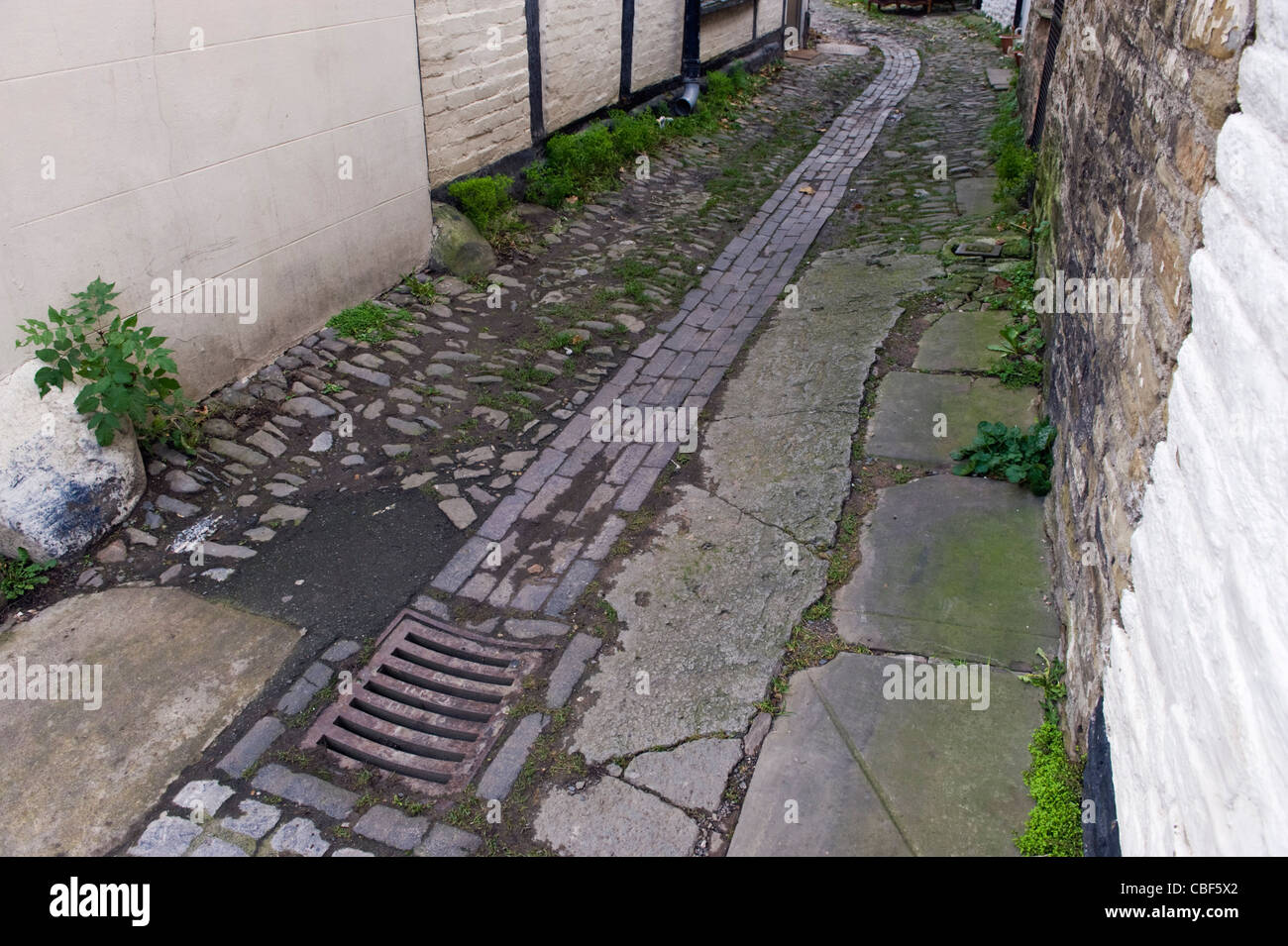 Victorian drainage system on cobbled lane in Kington Herefordshire England UK Stock Photo