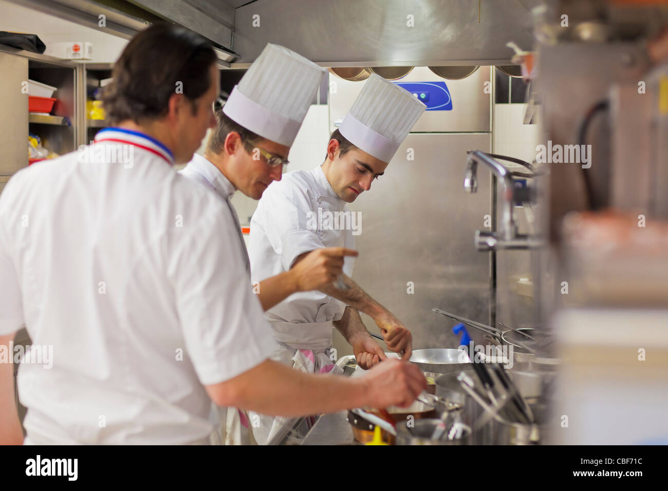 The Chef, Christophe Bacquié and his kitchen brigade., HOTEL DU CASTELLET,5 stud Relay and Castle in Provence 3001 Route des Ha Stock Photo