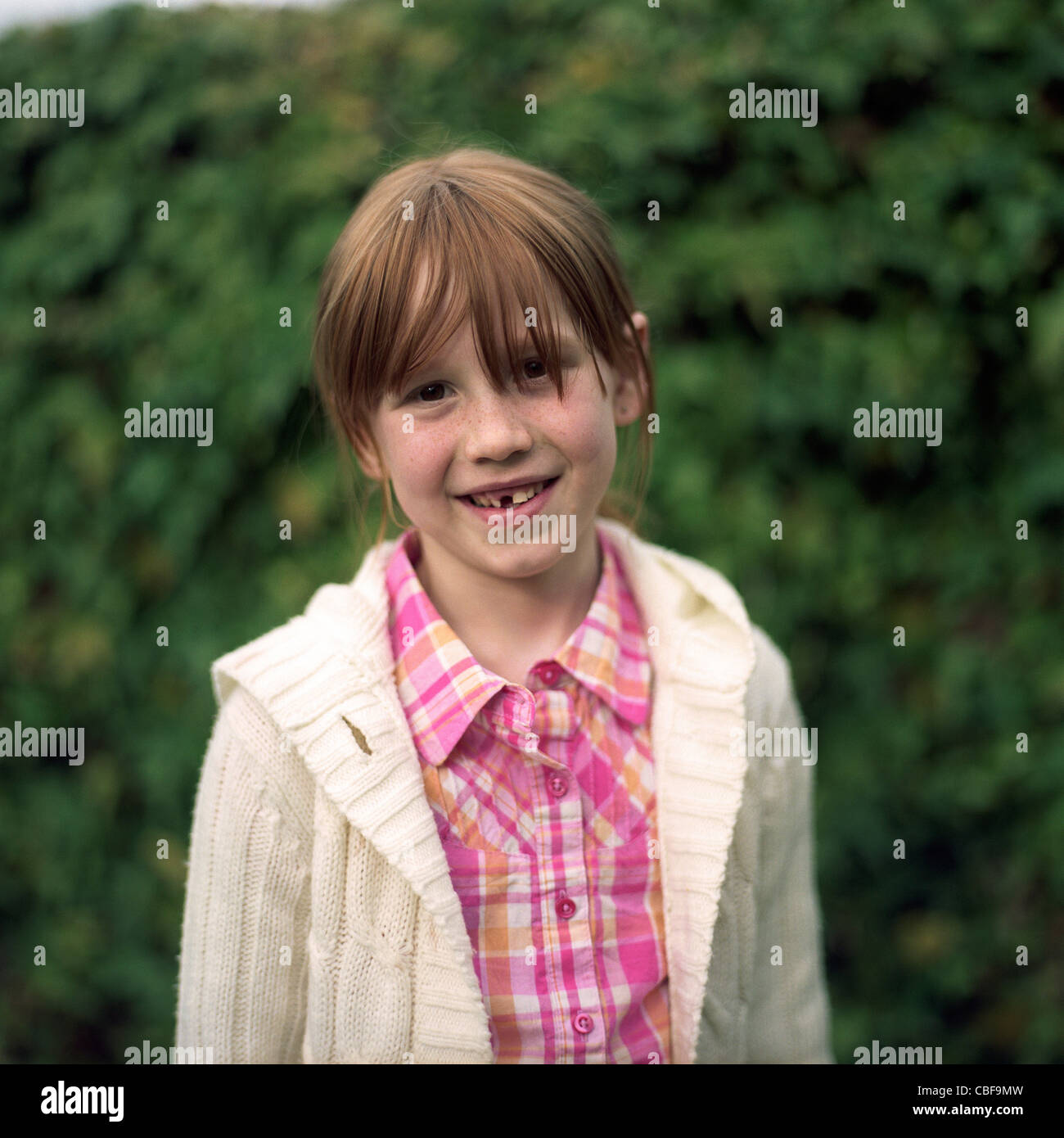 Girl standing outdoors portrait Stock Photo
