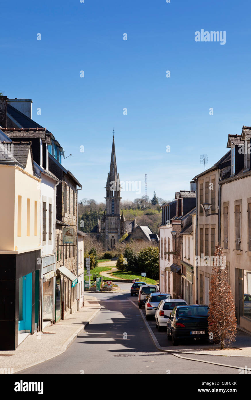 Street and church of Notre des de Portes at Chateauneuf du Faou, Brittany, France Stock Photo