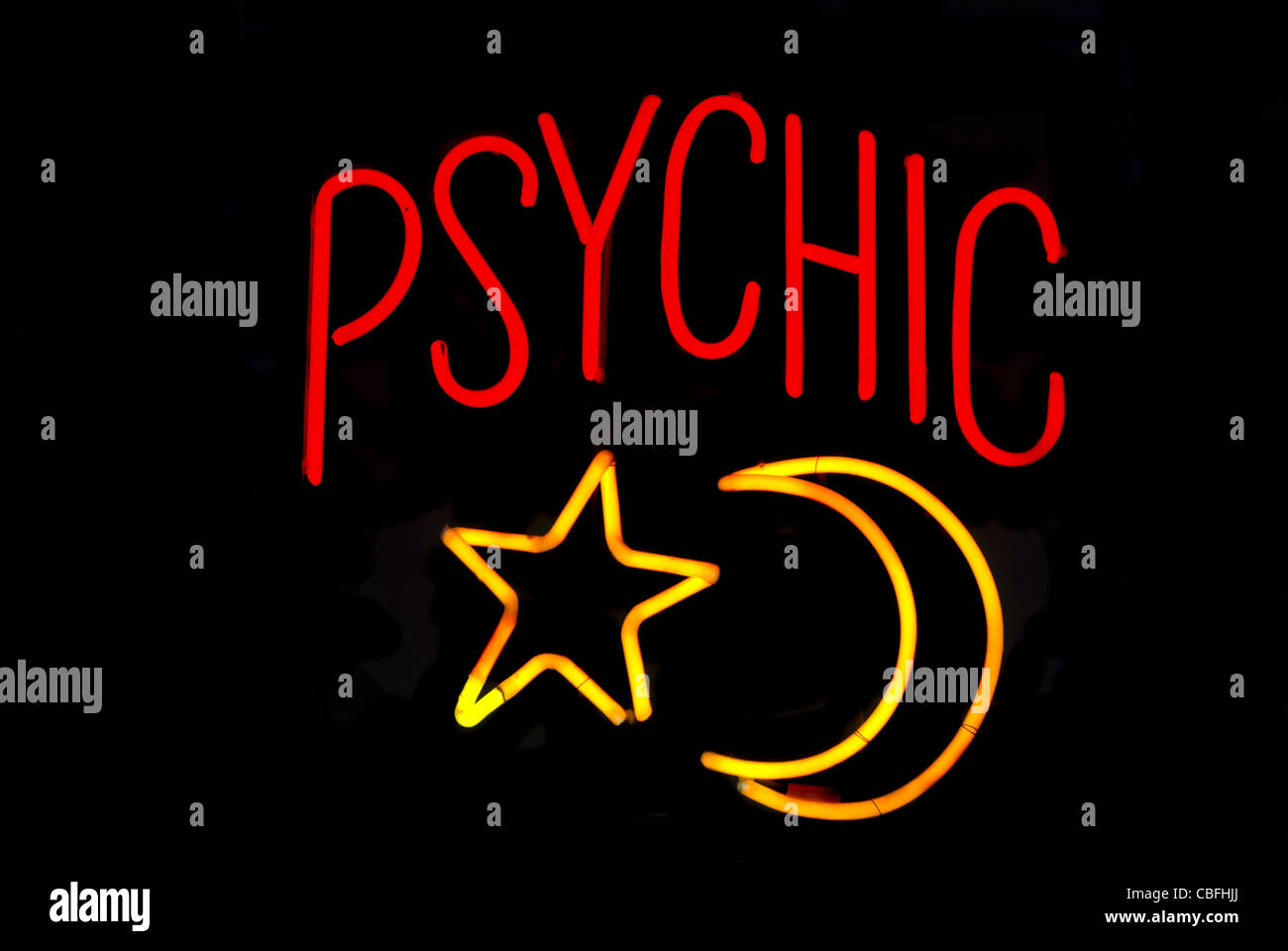 Psychic neon sign with moon and star Stock Photo