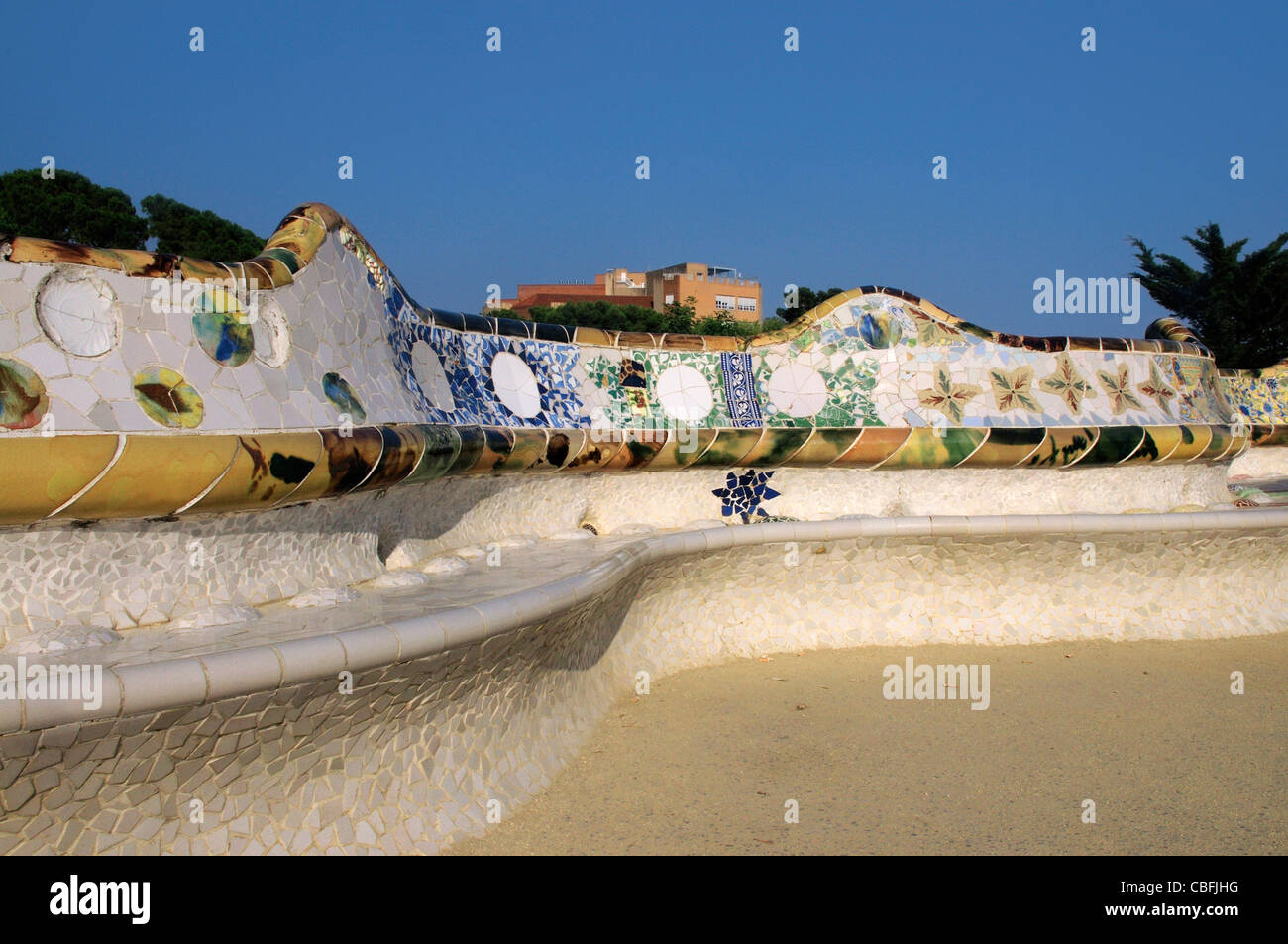 The Wave Bench mosaic seat by Antonio Gaudi within Parc Guell Stock Photo