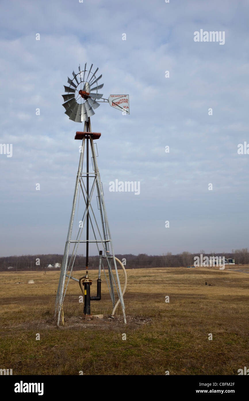 A windmill pumps methane gas from decaying garbage at St. Clair County's Smith's Creek Landfill. Stock Photo