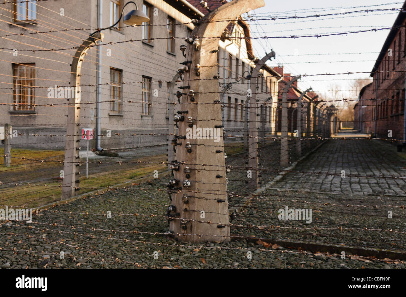 Electric fence at Auschwitz nazi concentration camp to stop escape from barracks Stock Photo
