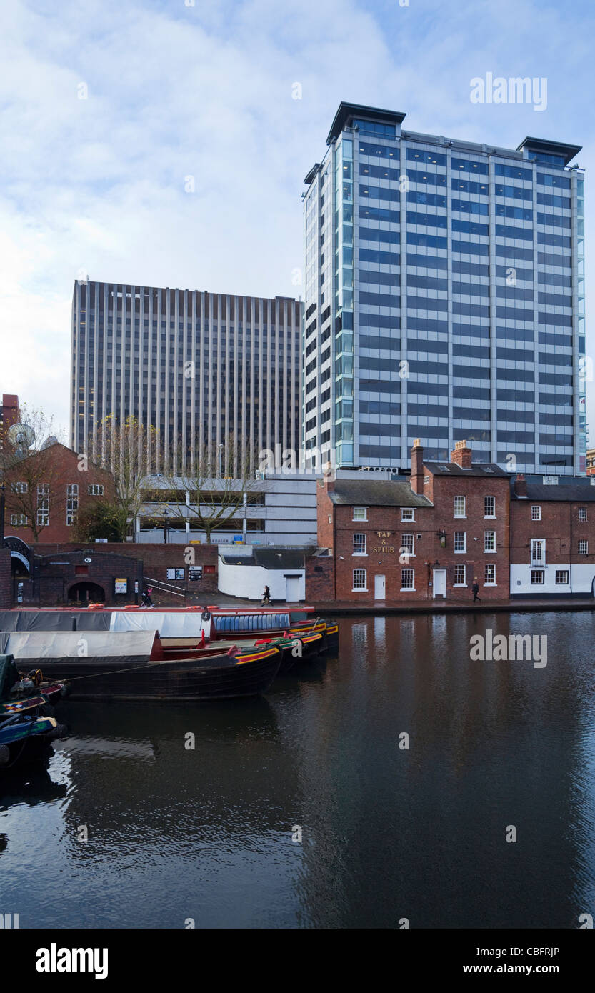 Modern Office Buildings Dwarfing the Tap and Spile Pub, Gas Street Canal Basin,  Birmingham City Centre, England, UK Stock Photo