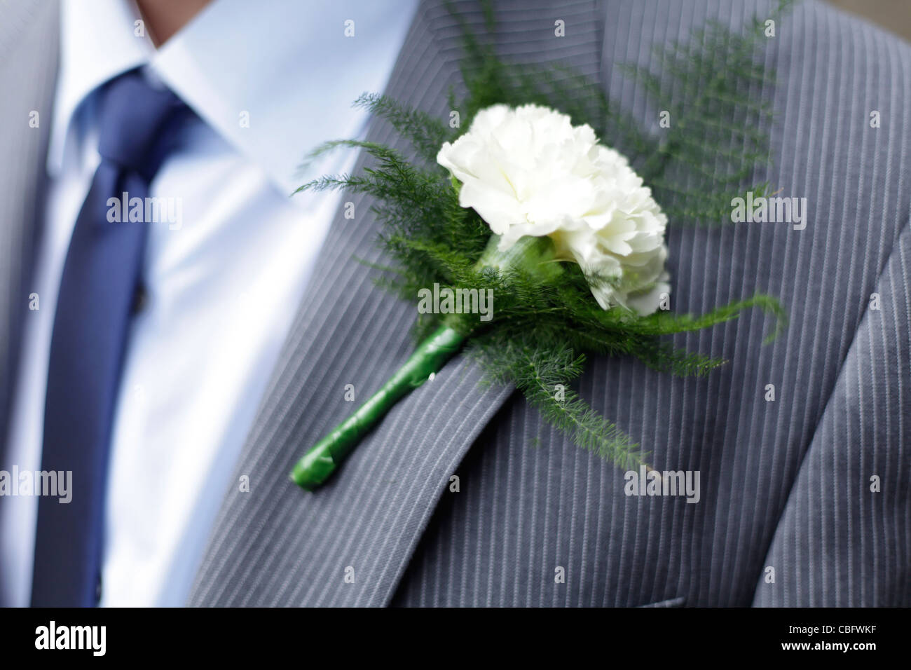 Buttonhole flower worn at a close friends wedding Stock Photo Alamy