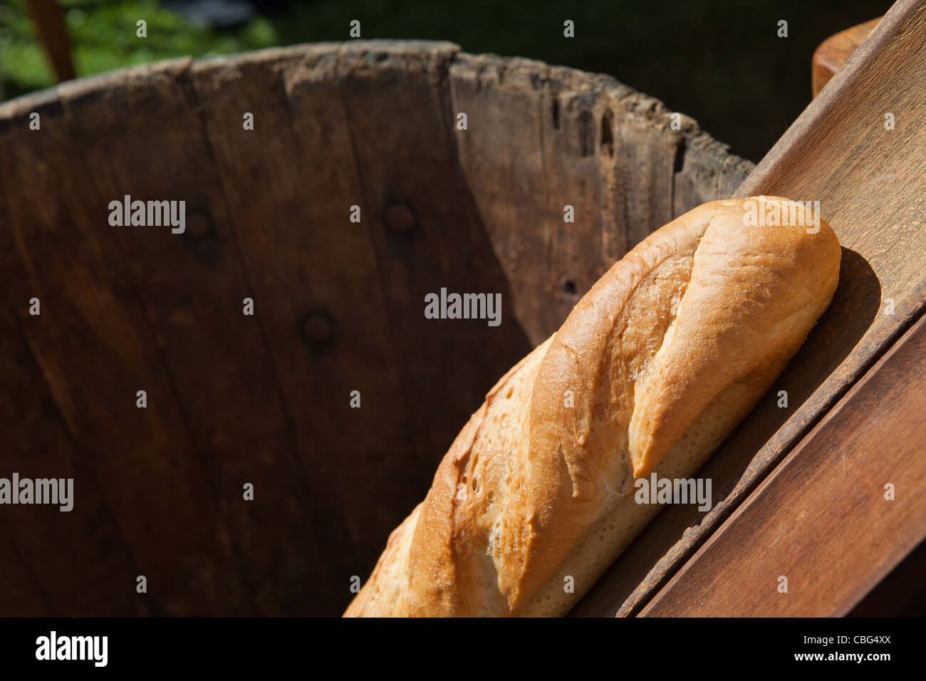 French stick in wooden barrel Stock Photo Alamy