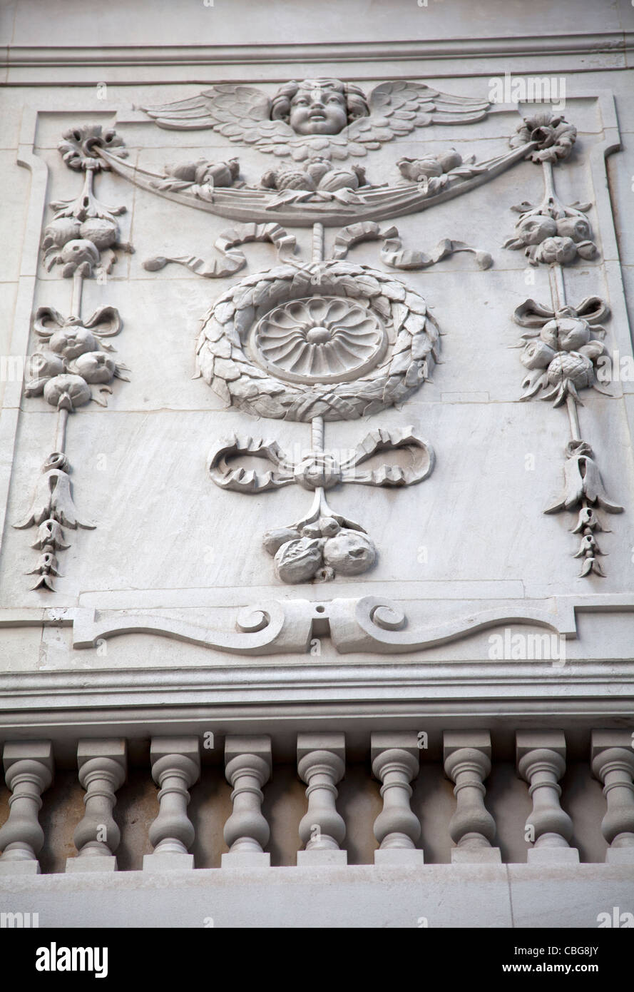 24 Portland Place - Relief Carving on stone wall - London UK Stock Photo