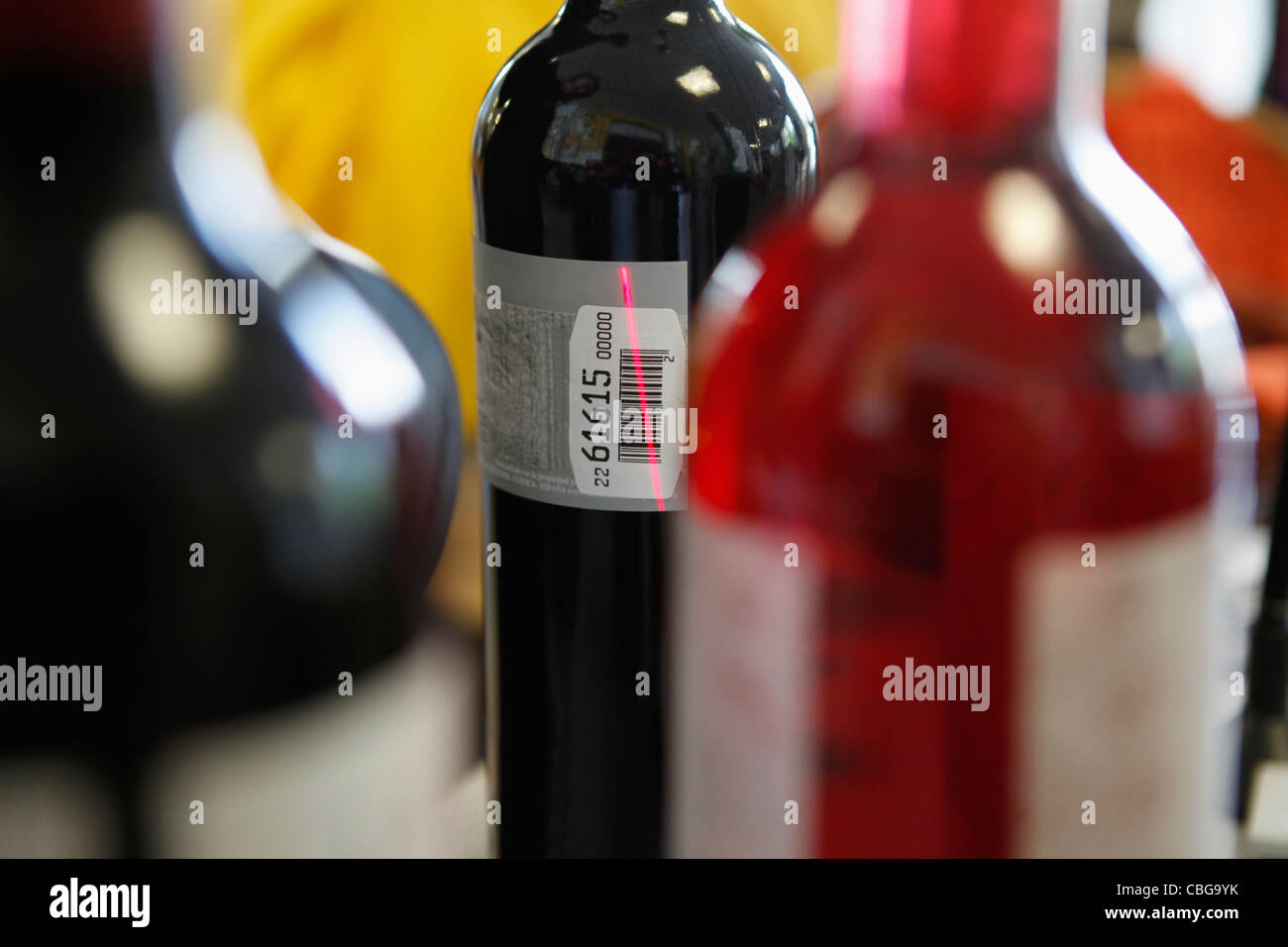 Wine bottle being scanned Stock Photo