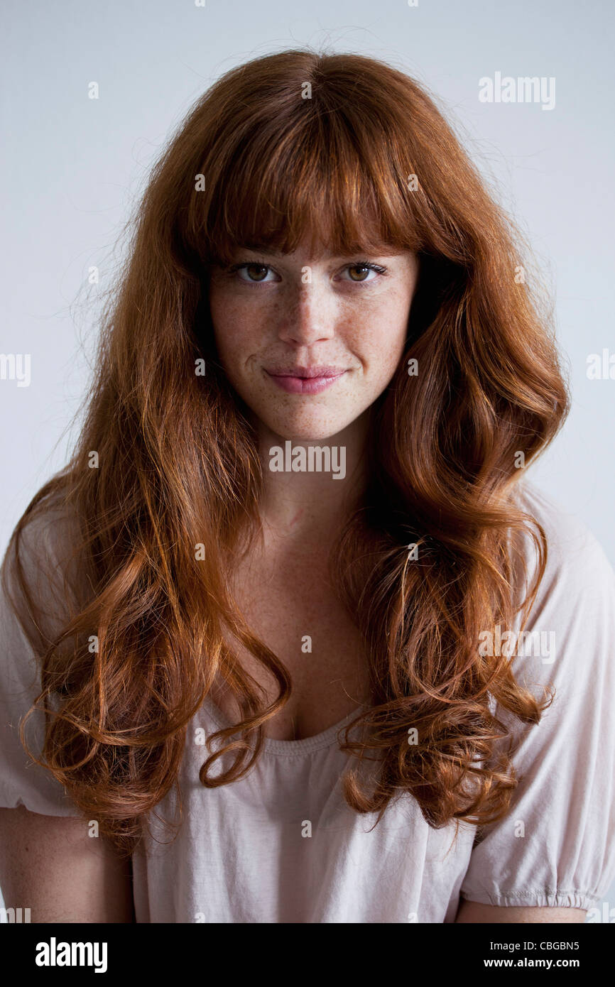 A beautiful young red haired woman, portrait Stock Photo - Alamy