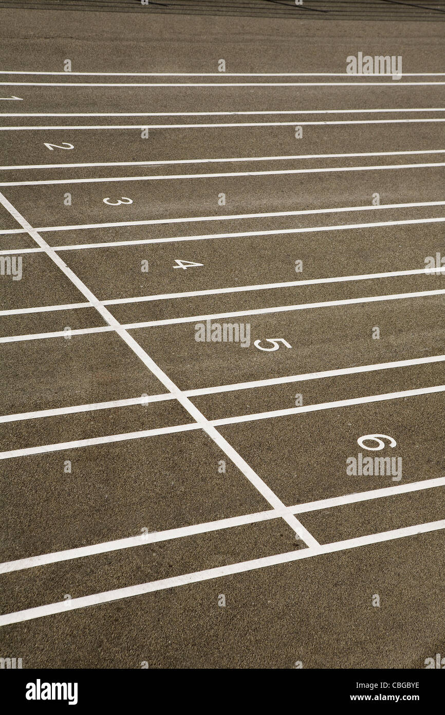 Numbered lanes on a track field Stock Photo - Alamy