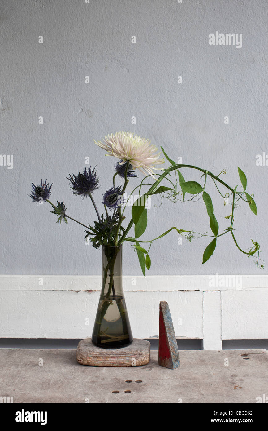 Vase of flowers on table Stock Photo Alamy