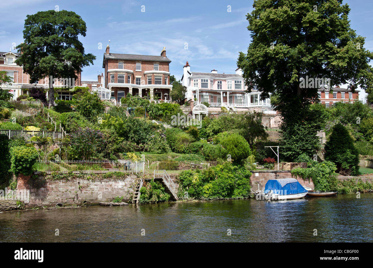 Houses on the banks of the River Dee in Chester, England Stock Photo
