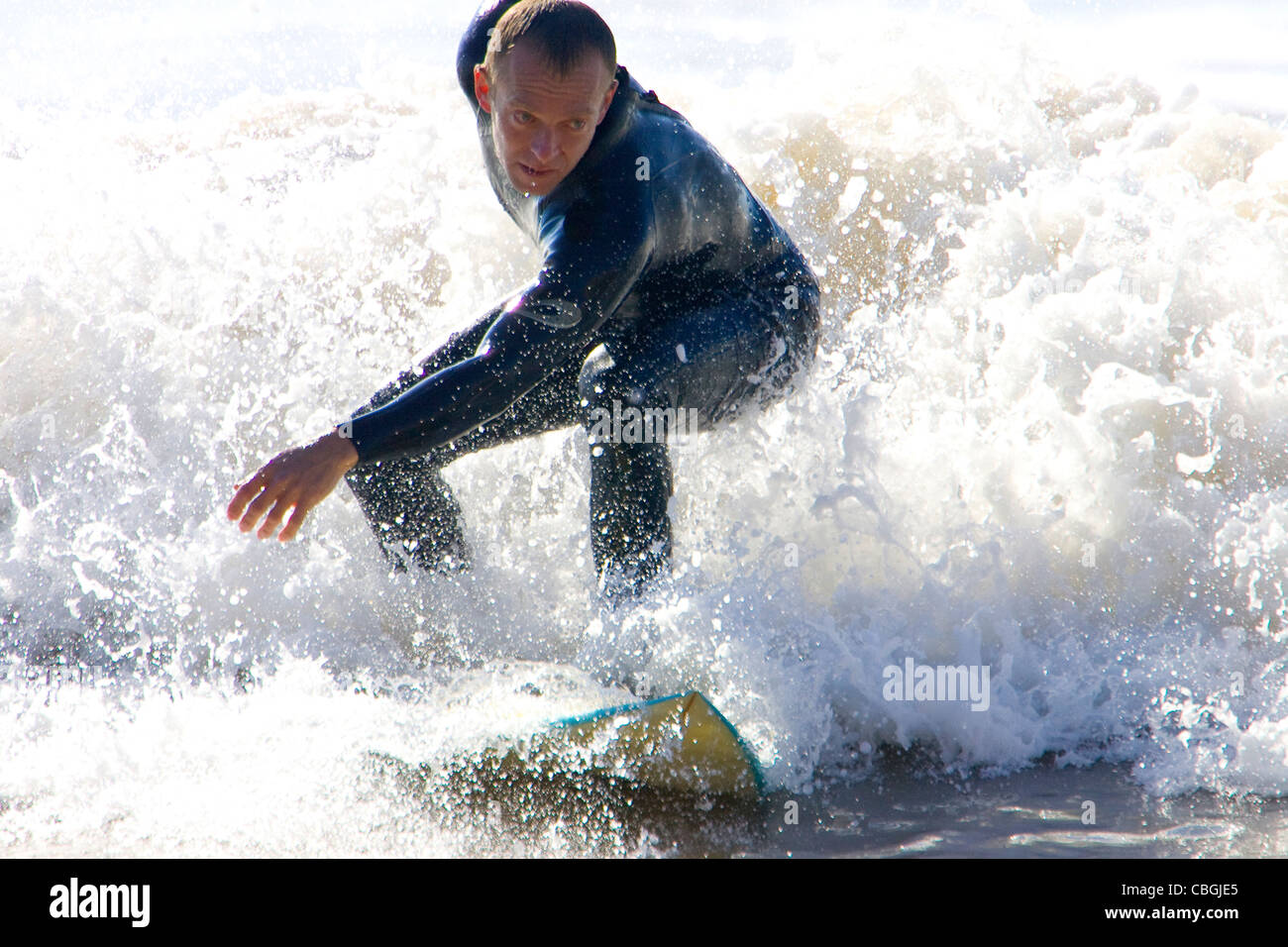 Surfer, surf, surfing, Compton Bay, Isle of Wight, England, UK Stock Photo Alamy