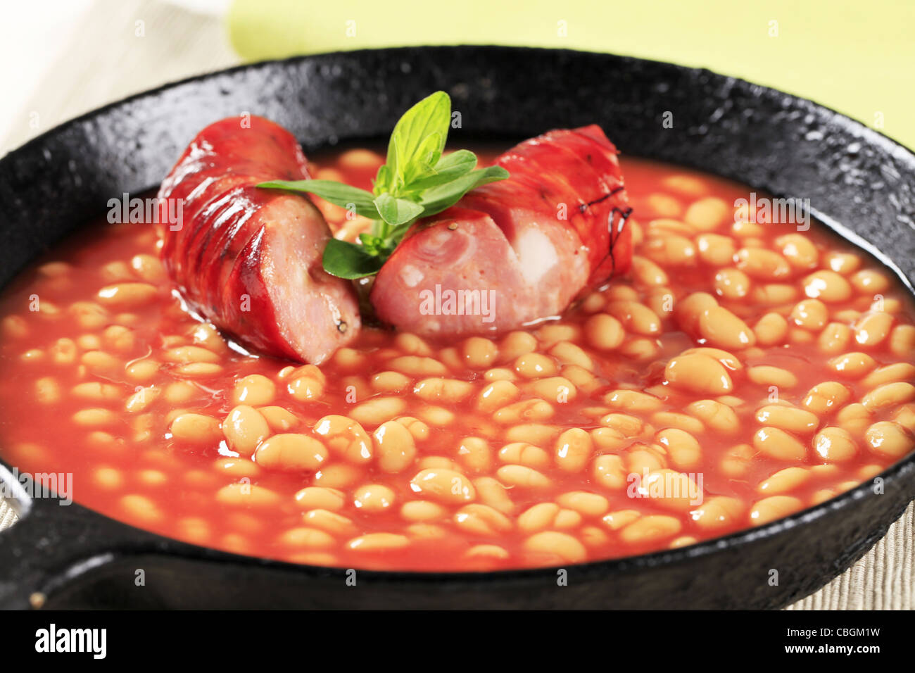 Baked beans and sausage in a fry pan Stock Photo Alamy