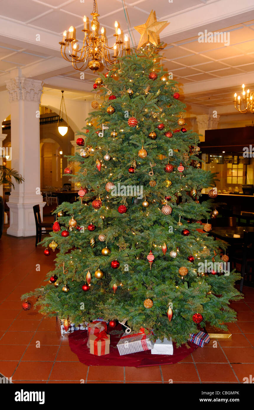 Christmas tree in Raffles Hotel, Singapore, Asia Stock Photo