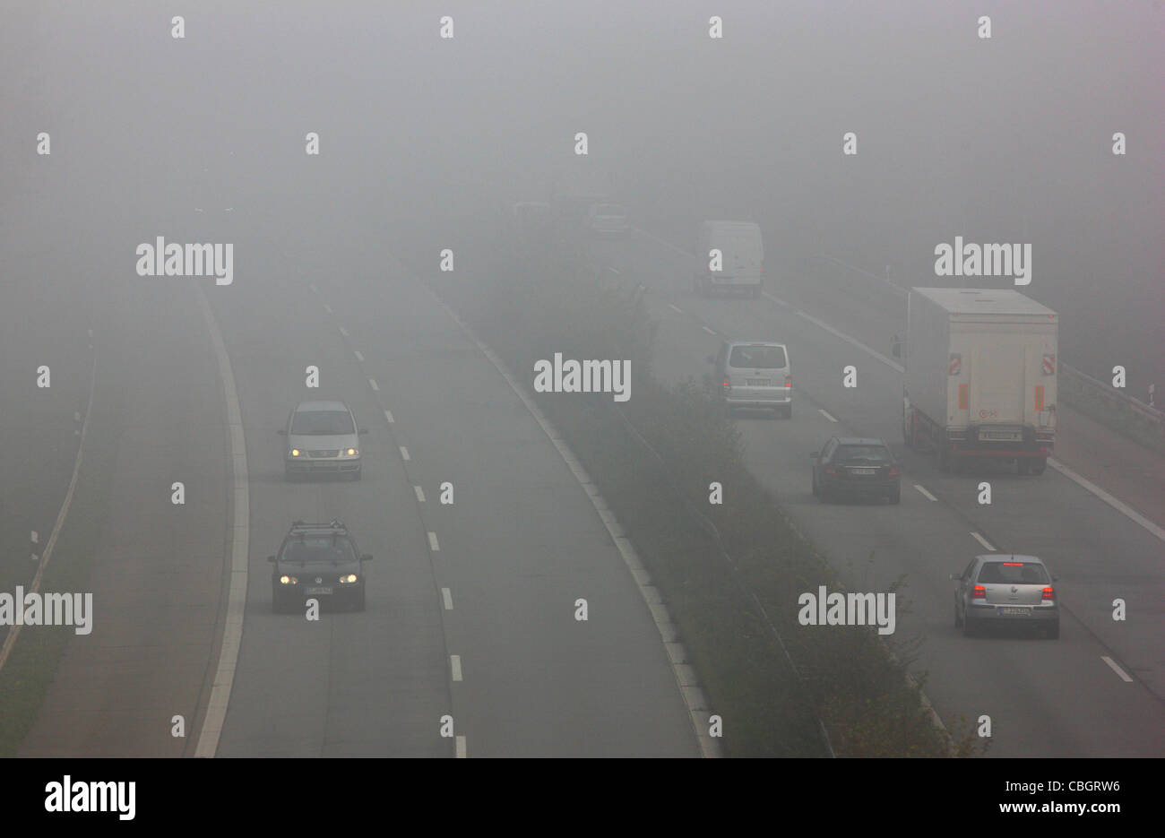 Motorway, Autobahn A52, traffic in thick fog. Essen, Germany, Europe. Stock Photo