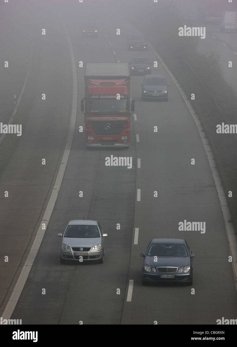 Motorway, Autobahn A52, traffic in thick fog. Essen, Germany, Europe. Stock Photo