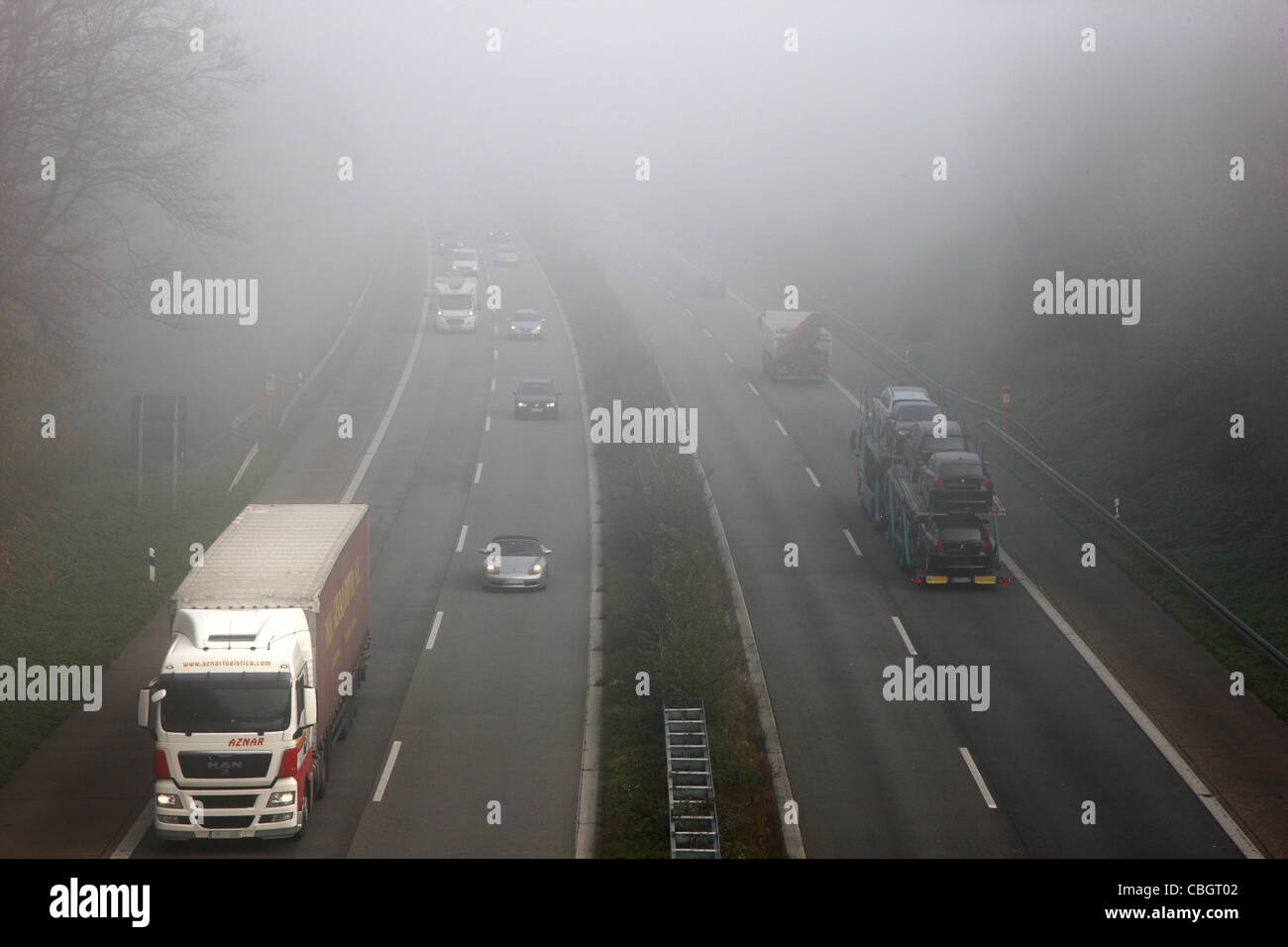 Motorway, Autobahn A52, traffic in thick fog. Essen, Germany, Europe. Stock Photo