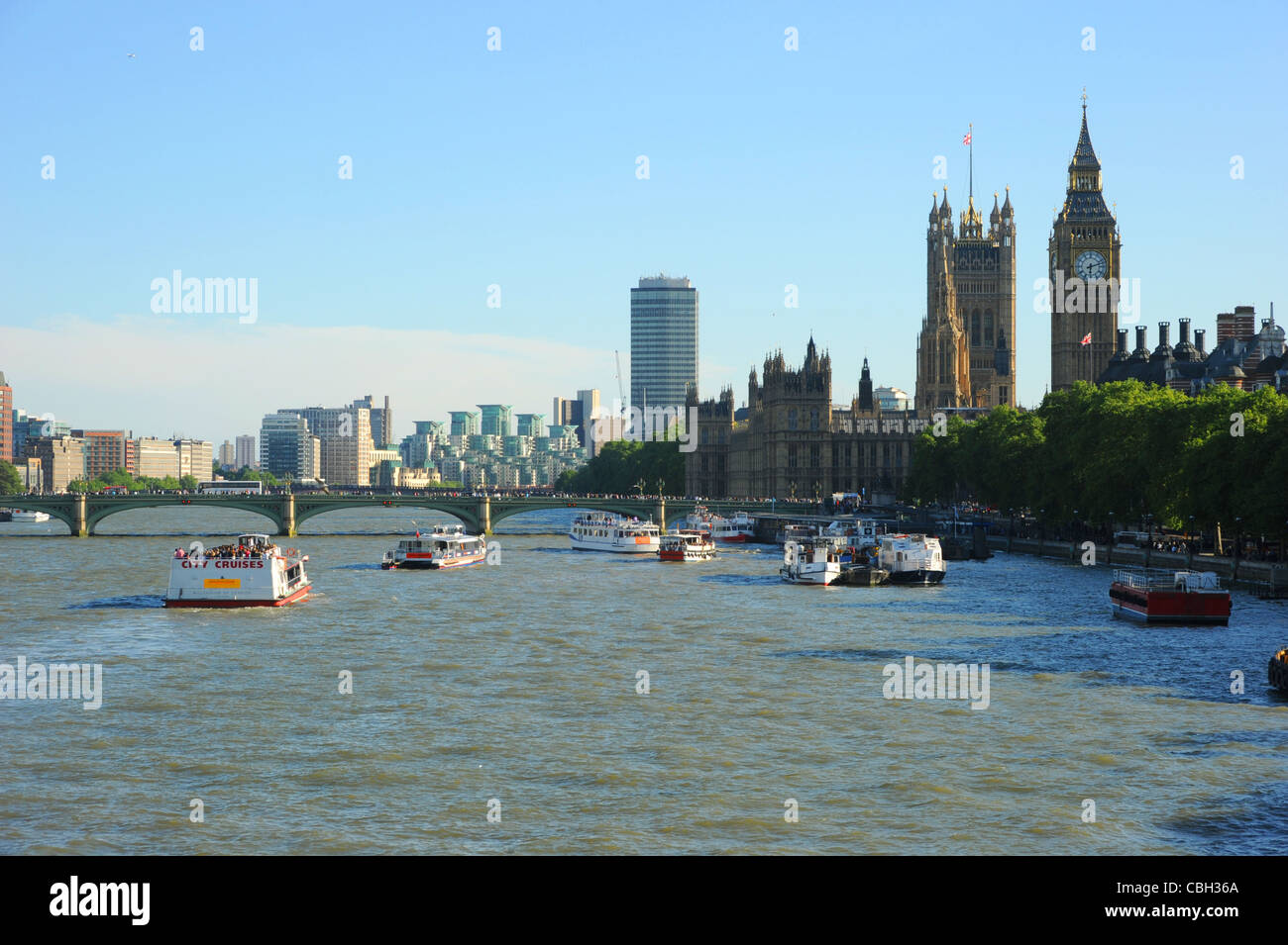 River Thames with water traffic, Westminster Bridge, Big Ben and the houses of parliament. Stock Photo