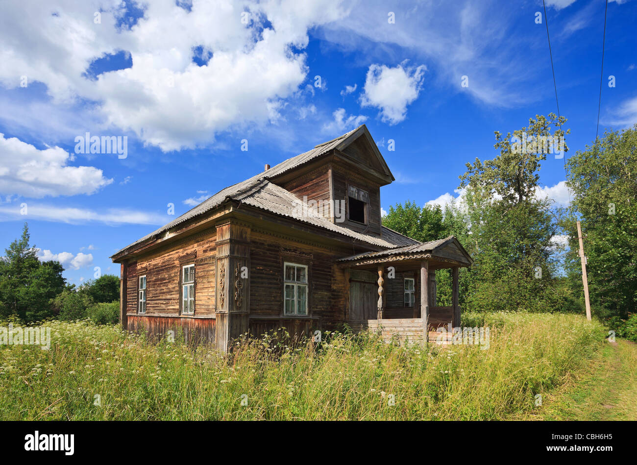 Old wooden house in russian village Stock Photo - Alamy
