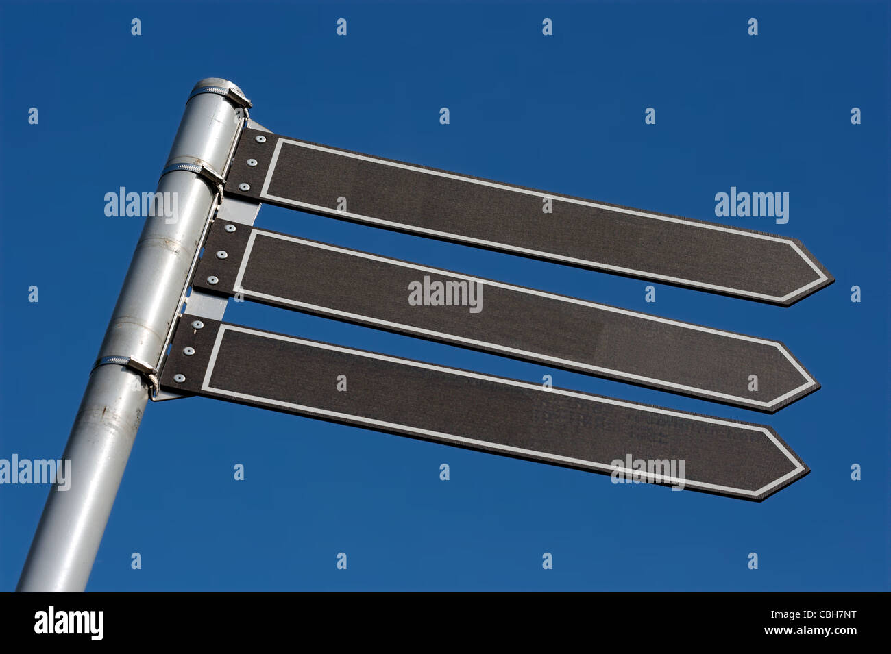 Signpost with three boards, add your own text Stock Photo - Alamy