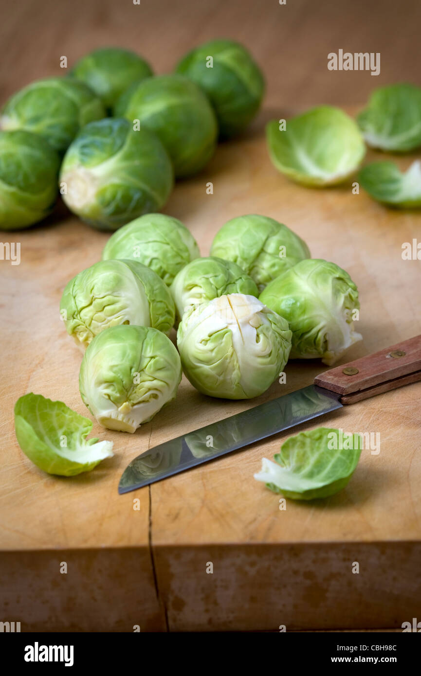 preparing brussel sprouts for cooking Stock Photo