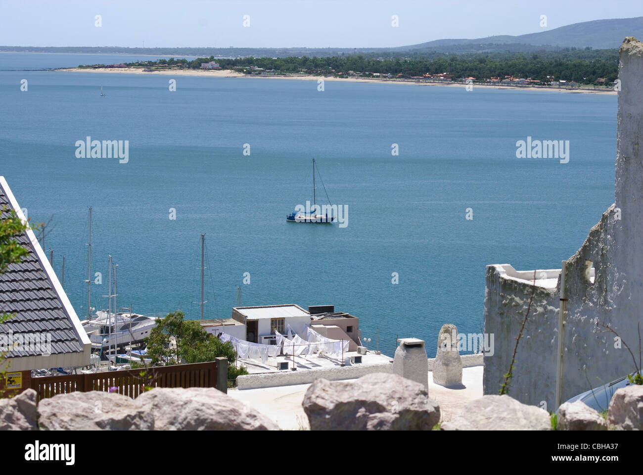 Bay of dreams at international tourism spot with sailing boat. Piriapolis, Maldonado, Uruguay.  Stock Photo