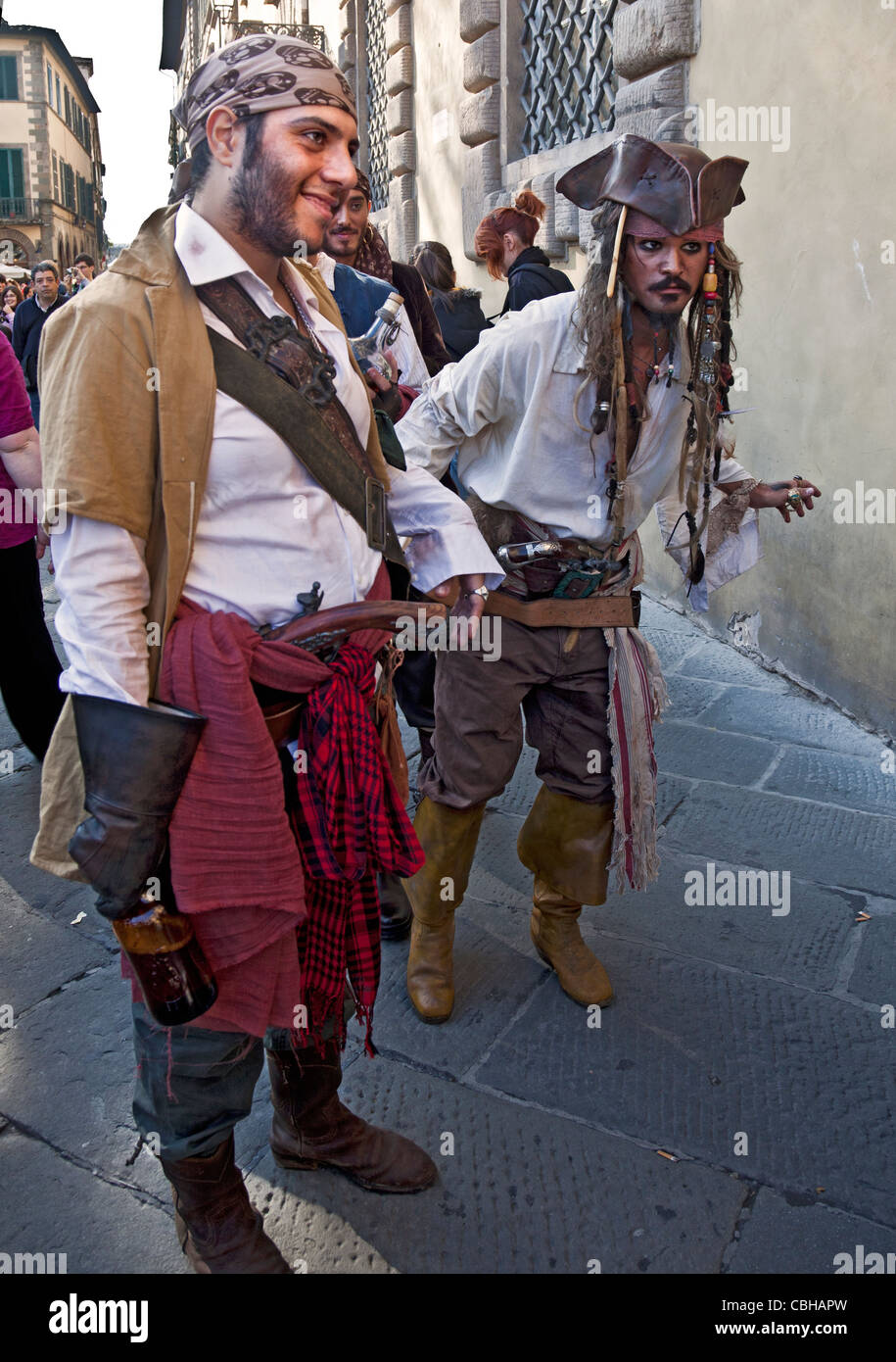 Young men dressed as Captain Sparrow and other characters from Pirates of the Caribbean, Lucca comics and games festival, 2011 Stock Photo