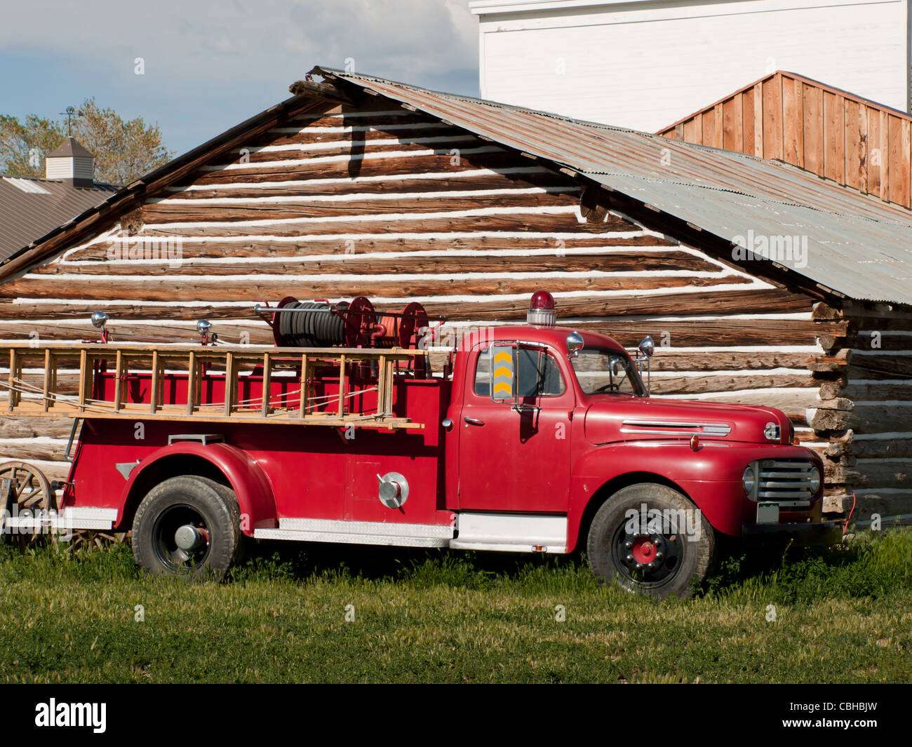 A mint-condition antique firetruck shines in the sun. Museum of the Mountain West in Montrose, Colorado. Stock Photo