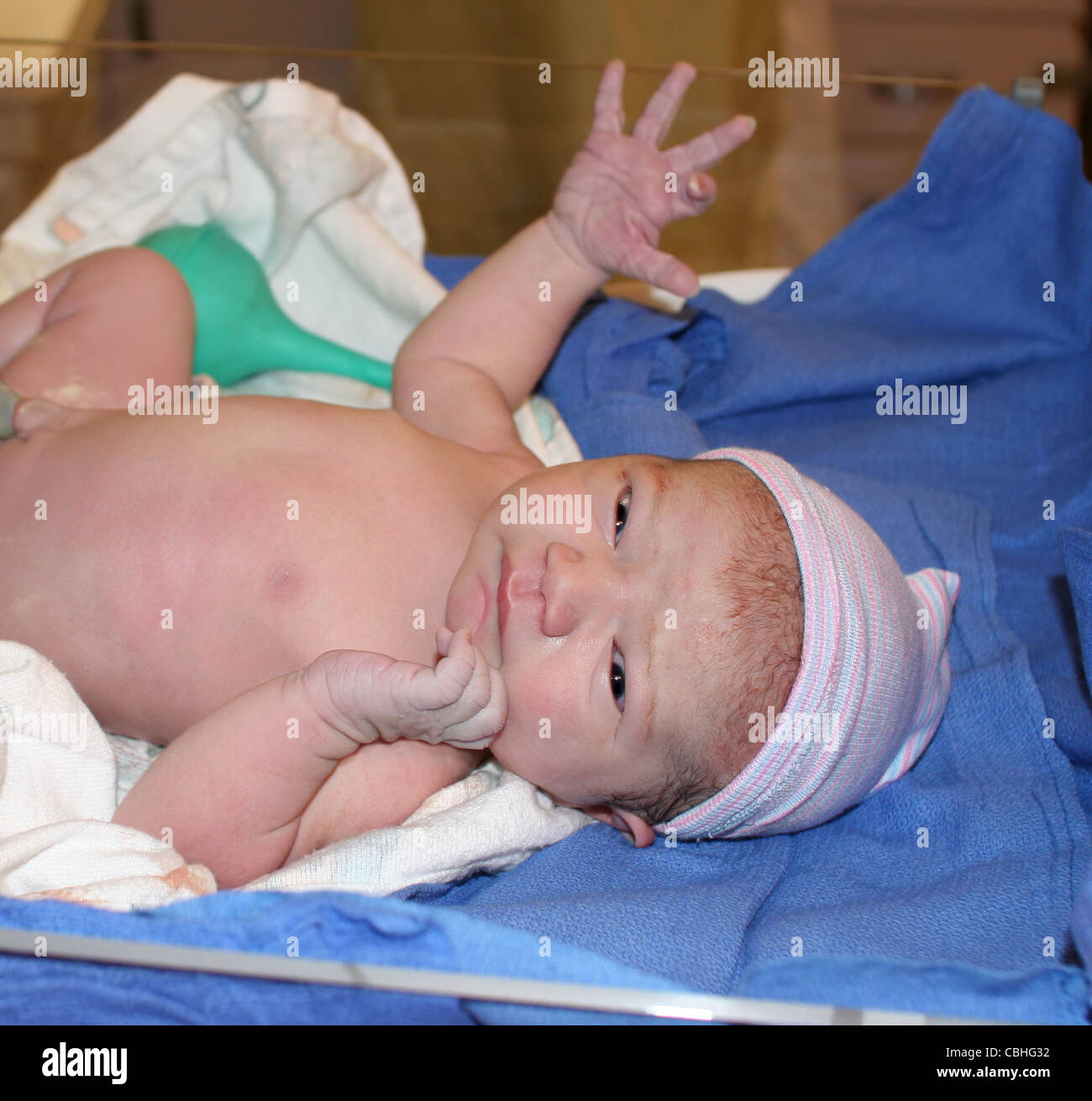 Newborn baby boy less than 20 min after birth Stock Photo
