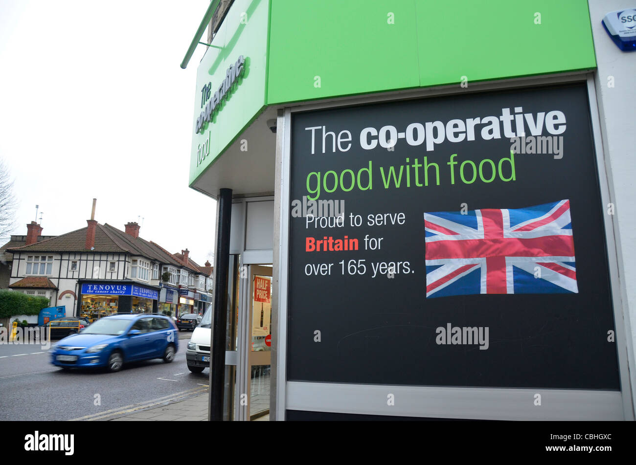 Printed british flag, Union Jack, Co-operative supermarket building entrance, Henleaze, Bristol, England, UK Stock Photo